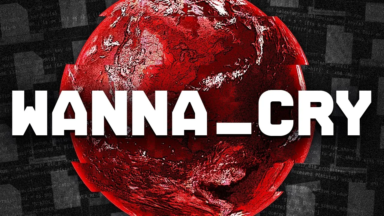 Screen displaying WannaCry ransomware looking like a big red virus with lots of computer files and code in the background.
